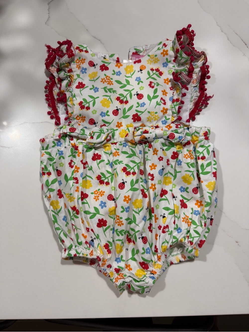 Girls Floral Ladybug Ruffle Romper - White with Red Trim
